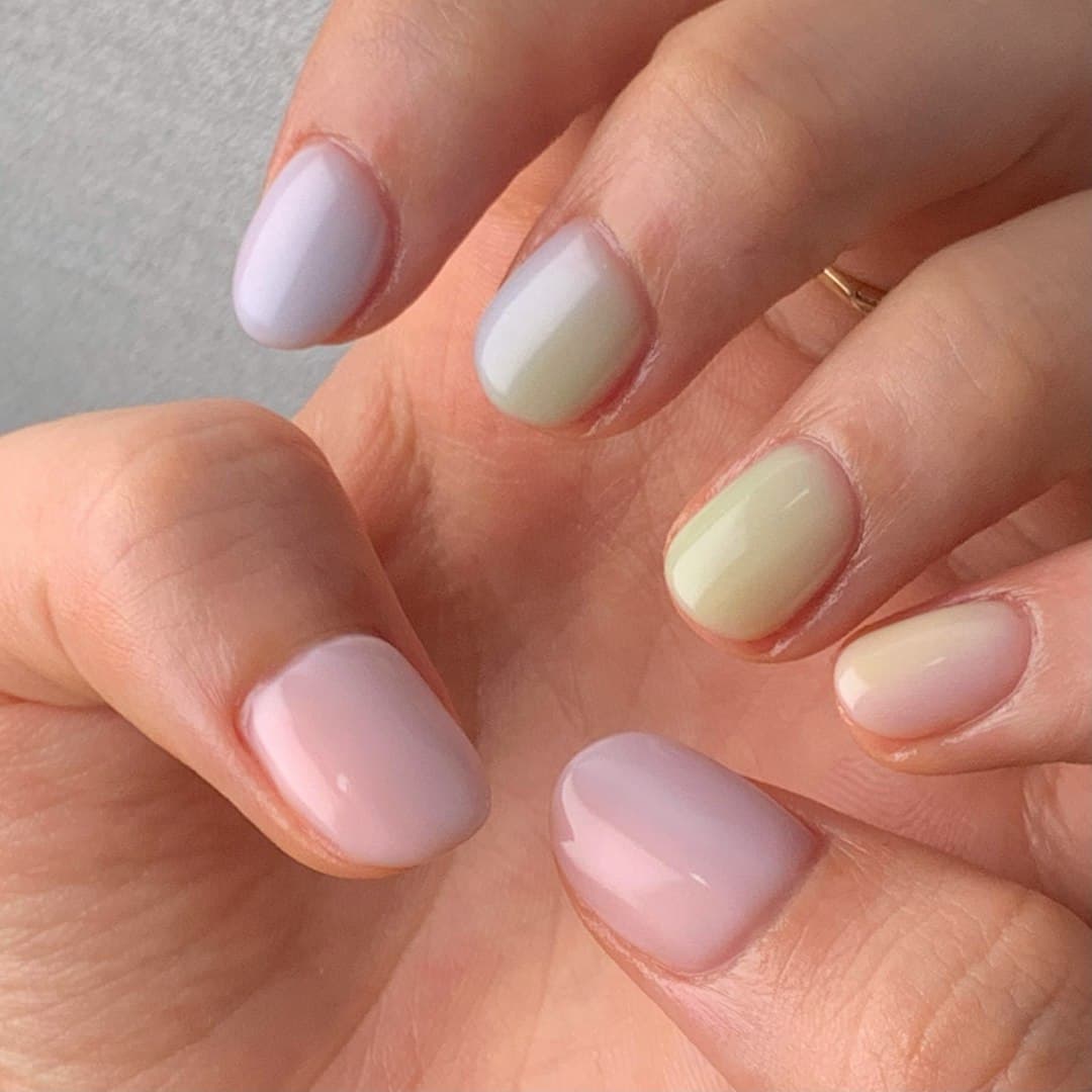 Milk-glass pastel jelly nails with a soft translucent shine.